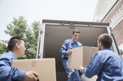 Removal van and moving boxes in a Finsbury street