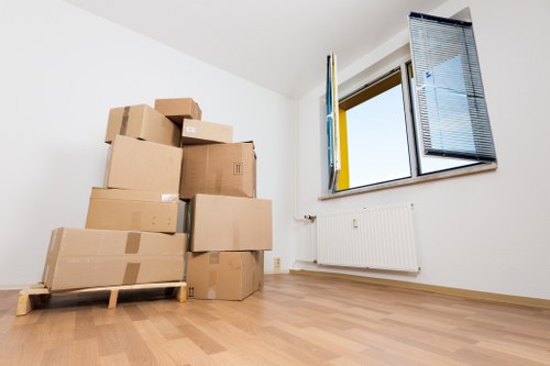 Furniture being carried from a flat in Finsbury