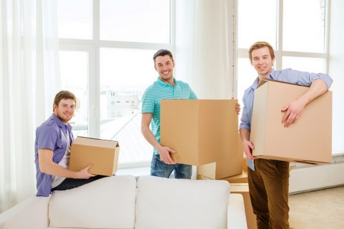 Local removals team planning access in a central London street